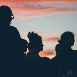 group of people looking upward